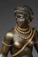 PENDULE de L'AFRIQUEen bronze ciselé, doré ou patiné, à décor...